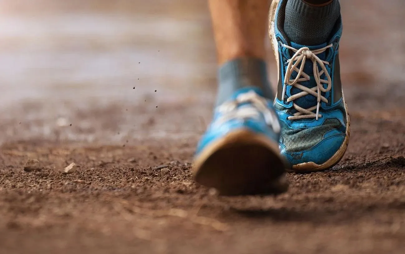 A.'s shoes on a trail.